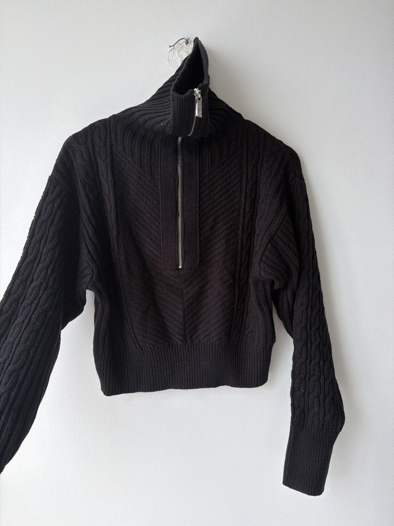 Black Cable Knit Quarter Zip Mock Neck Cropped Sweater (Category: Others Tops) located in Makati City. Submitted by cheapipie (Listing ID 1455895690, Image 1). Description: - Black cropped sweater/ can be worn multiple ways. Check pic. - Mock neck with quarter zip - Mix of cable knit and chevron patterns please check the pattern on pics - Ribbed cuffs and hem - Estimated size: Small to Medium - Versatile for layering or standalone wear -BNWOT dee