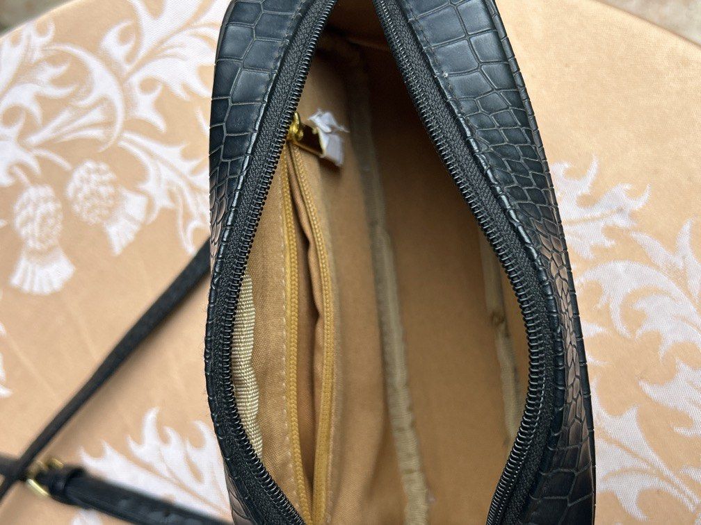 black croc-leather bag (Category: Cross-body Bags) located in San Pablo. Submitted by mallowclouds (Listing ID 1455937380, Image 3). Description: - bought from Traviel on IG 🏷️ black bag, crossbody bag, croc leather.
