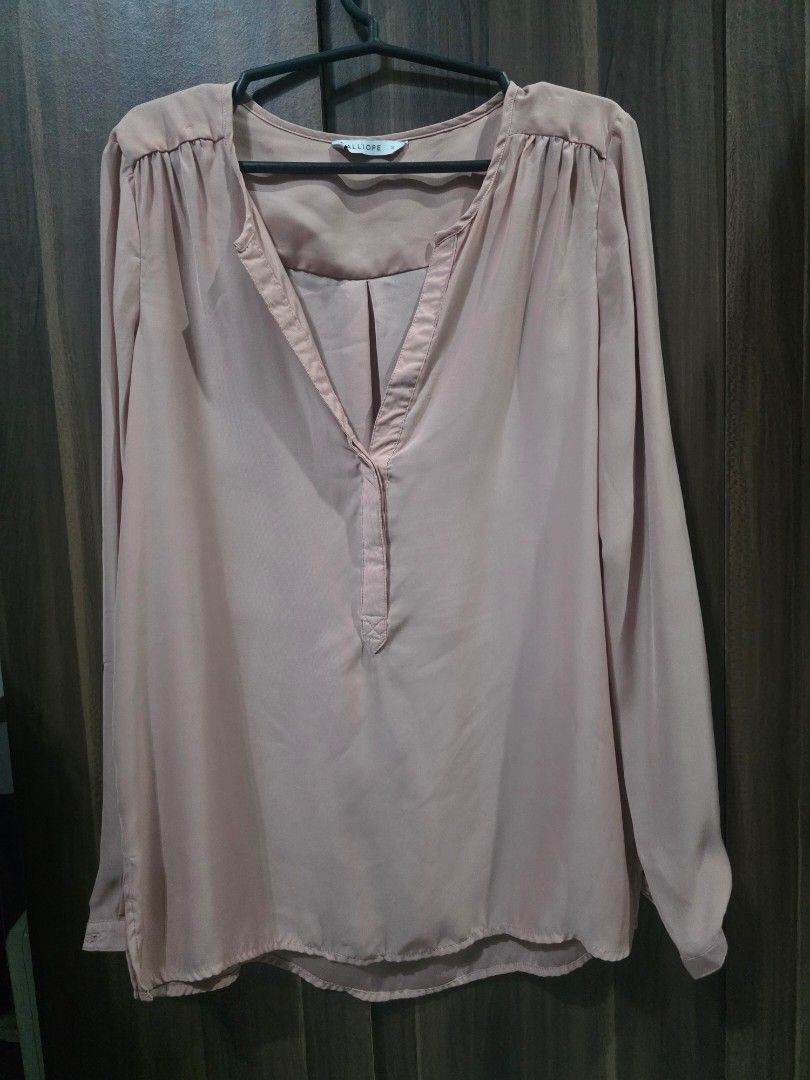 Calliope Peach Long Sleeve Blouse Size S (Category: Blouses) located in Taytay. Submitted by chi.locker (Listing ID 1455866200, Image 1). Description: - peach long sleeve blouse from Calliope. color is darker than in photo) - Size S - Button detail at neckline and cuffs - Sheer fabric with a slight sheer and low neckline. Might need inner wear (cami) - Ideal for layering.