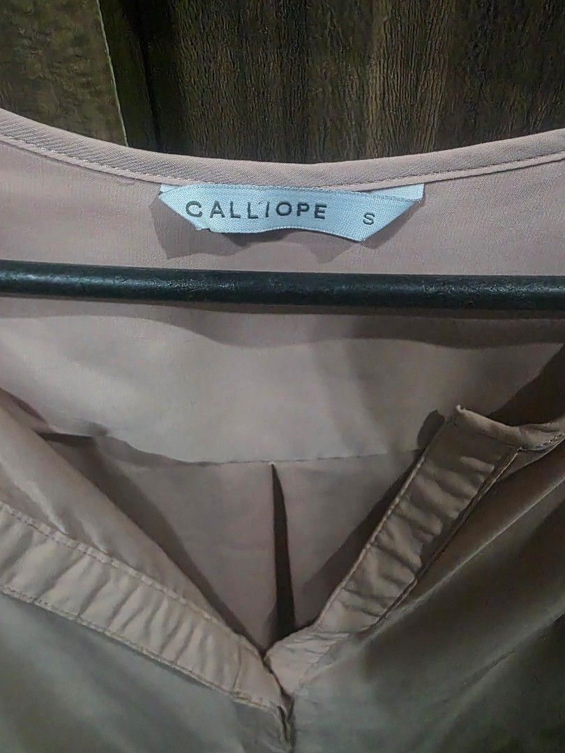 Calliope Peach Long Sleeve Blouse Size S (Category: Blouses) located in Taytay. Submitted by chi.locker (Listing ID 1455866200, Image 2). Description: - peach long sleeve blouse from Calliope. color is darker than in photo) - Size S - Button detail at neckline and cuffs - Sheer fabric with a slight sheer and low neckline. Might need inner wear (cami) - Ideal for layering.