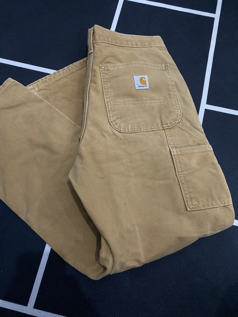 Carhartt Double Knee Work Pants Tan (Category: Jeans) located in Porac. Submitted by moethrifter (Listing ID 1456041789, Image 2). Description: - Classic Carhartt work pants in tan - Double knee construction for enhanced durability - size 30 .