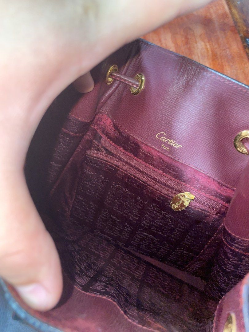 CARTIER BAG (Category: Luxury Bags & Wallets) located in Manila. Submitted by mileskyy271 (Listing ID 1455935325, Image 1). Description: Old and used but flaws is not visible, Real cartier bag. Firm on price..
