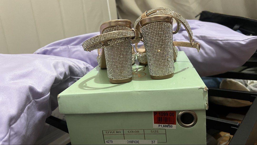 Champagne Rhinestone Platform Block Heels (Category: Heels) located in Paranaque City. Submitted by sangriiaa (Listing ID 1455966295, Image 3). Description: - Used once only - Sparkly champagne block heels - Rhinestone details / a few loose but not noticeable - Secure ankle strap - Stable block heel - Ideal for parties & special occasions - Size 37 - reason for selling: declutter Location: Parañaque City.