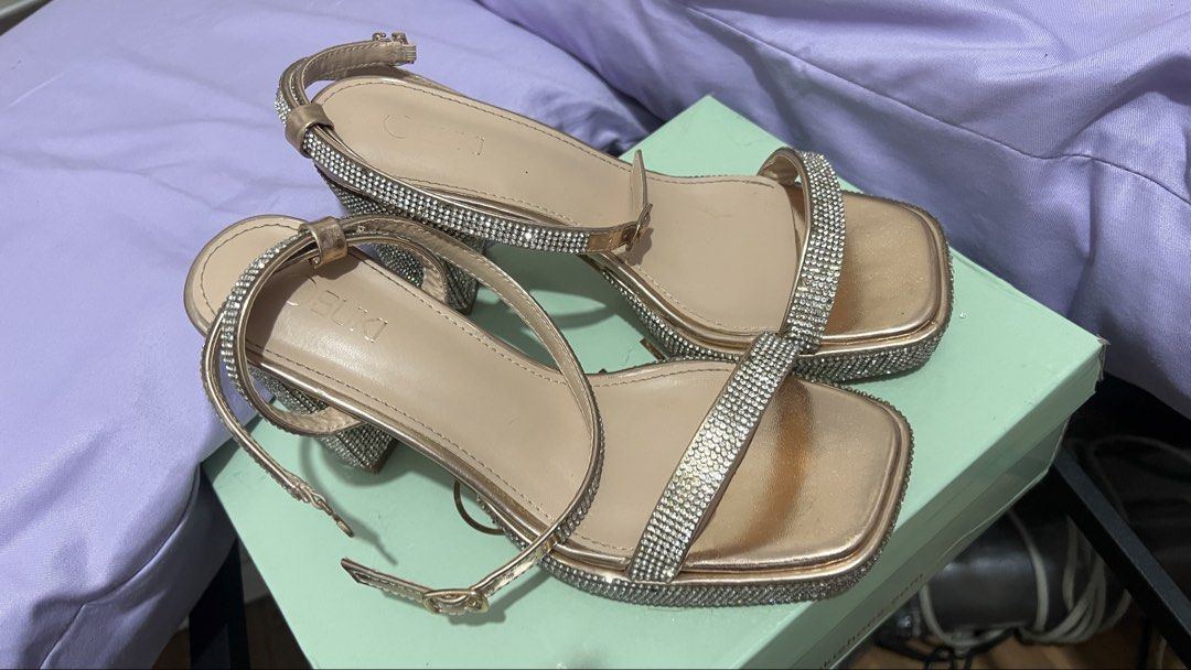 Champagne Rhinestone Platform Block Heels (Category: Heels) located in Paranaque City. Submitted by sangriiaa (Listing ID 1455966295, Image 2). Description: - Used once only - Sparkly champagne block heels - Rhinestone details / a few loose but not noticeable - Secure ankle strap - Stable block heel - Ideal for parties & special occasions - Size 37 - reason for selling: declutter Location: Parañaque City.