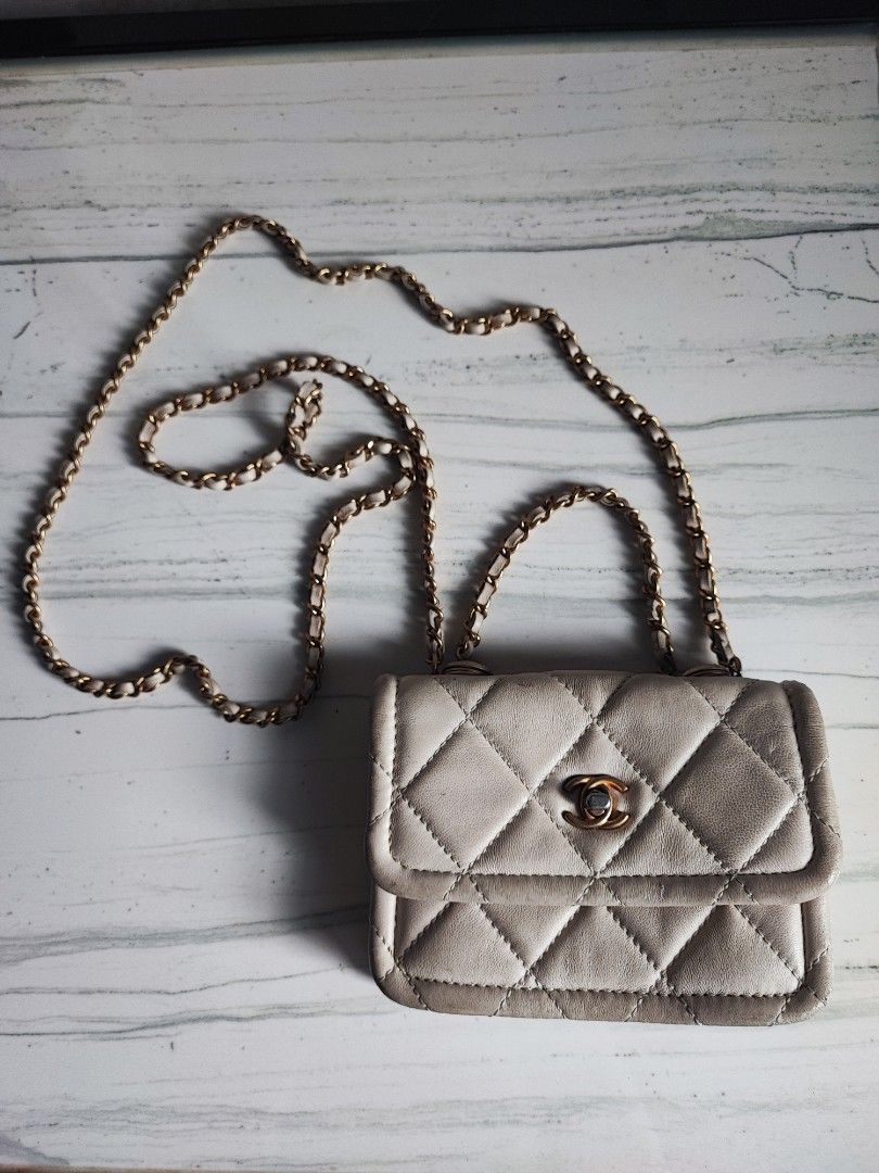 Chanel Quilted Chain Bag White (Category: Luxury Accessories) located in Tarlac. Submitted by venuslim1624398 (Listing ID 1455887727, Image 2). Description: - Preloved from Japan - White quilted mini bag - Classic Chanel-inspired style - Compact size, ideal for essentials - Features gold hardware.