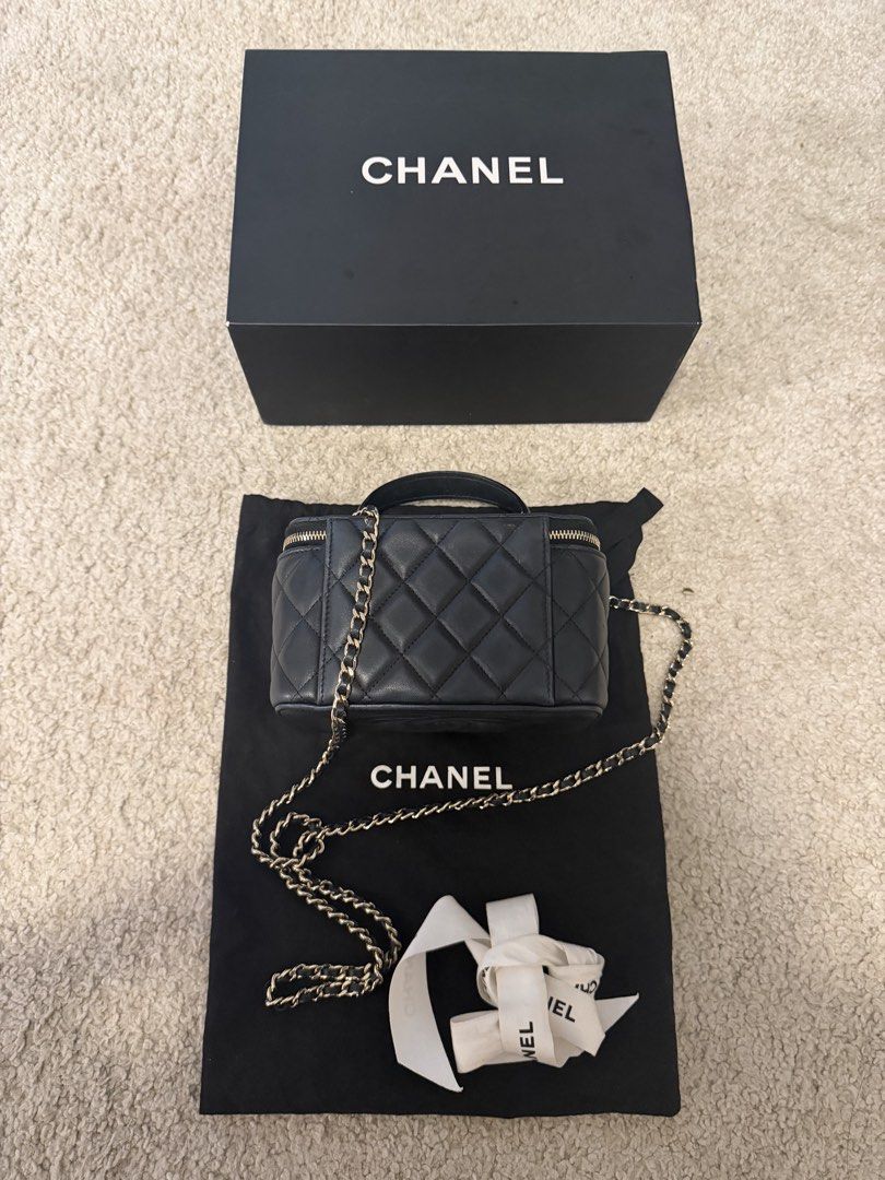 Chanel Vanity Bag Lambskin Black (Category: Luxury Bags & Wallets) located in Las Pinas. Submitted by naniiii14 (Listing ID 1455969199, Image 1). Description: FOR SALE!!! Chanel Vanity Bag Lambskin Black With Complete Inclusion. - Paper Bag. - Original Box. - Dust Bag. - Authenticity Card..
