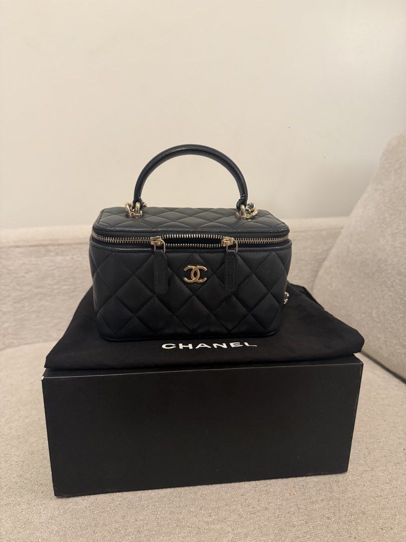 Chanel Vanity Bag Lambskin Black (Category: Luxury Bags & Wallets) located in Las Pinas. Submitted by naniiii14 (Listing ID 1455969199, Image 2). Description: FOR SALE!!! Chanel Vanity Bag Lambskin Black With Complete Inclusion. - Paper Bag. - Original Box. - Dust Bag. - Authenticity Card..