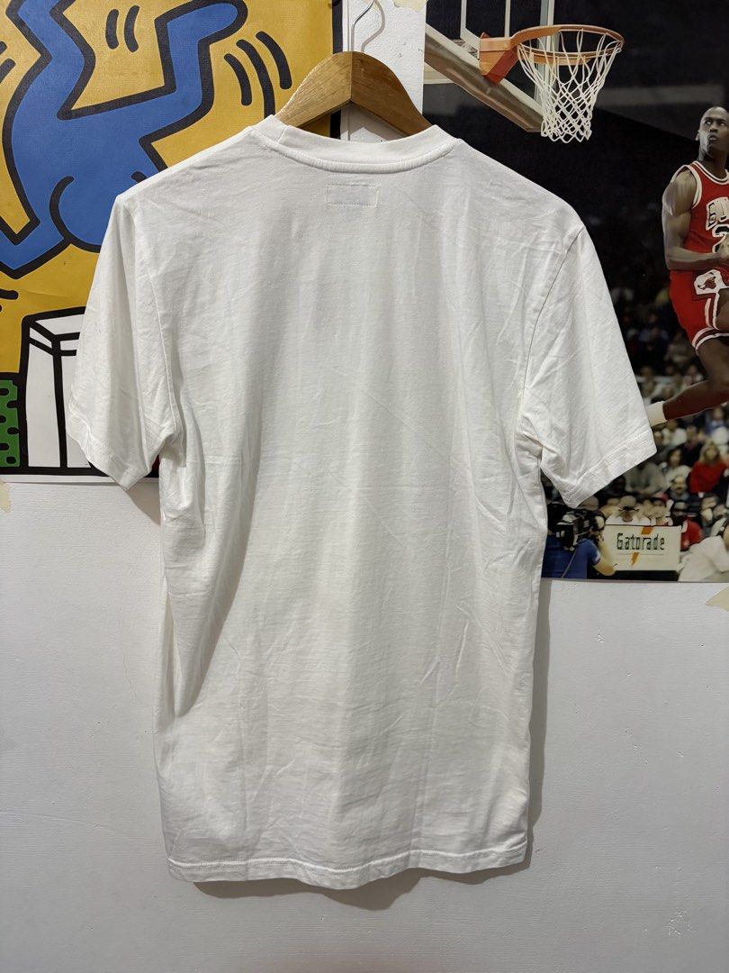 Chinatown Market (Category: Tshirts & Polo Shirts ) located in Echague. Submitted by jake_rc (Listing ID 1455988956, Image 2). Description: Chinatown Market white arc logo t-shirt. Arched lettering filled with various animal prints Size Medium on tag Dimes 19.5 x 29 Issue: small stain see last photo Price 750 plus SF.