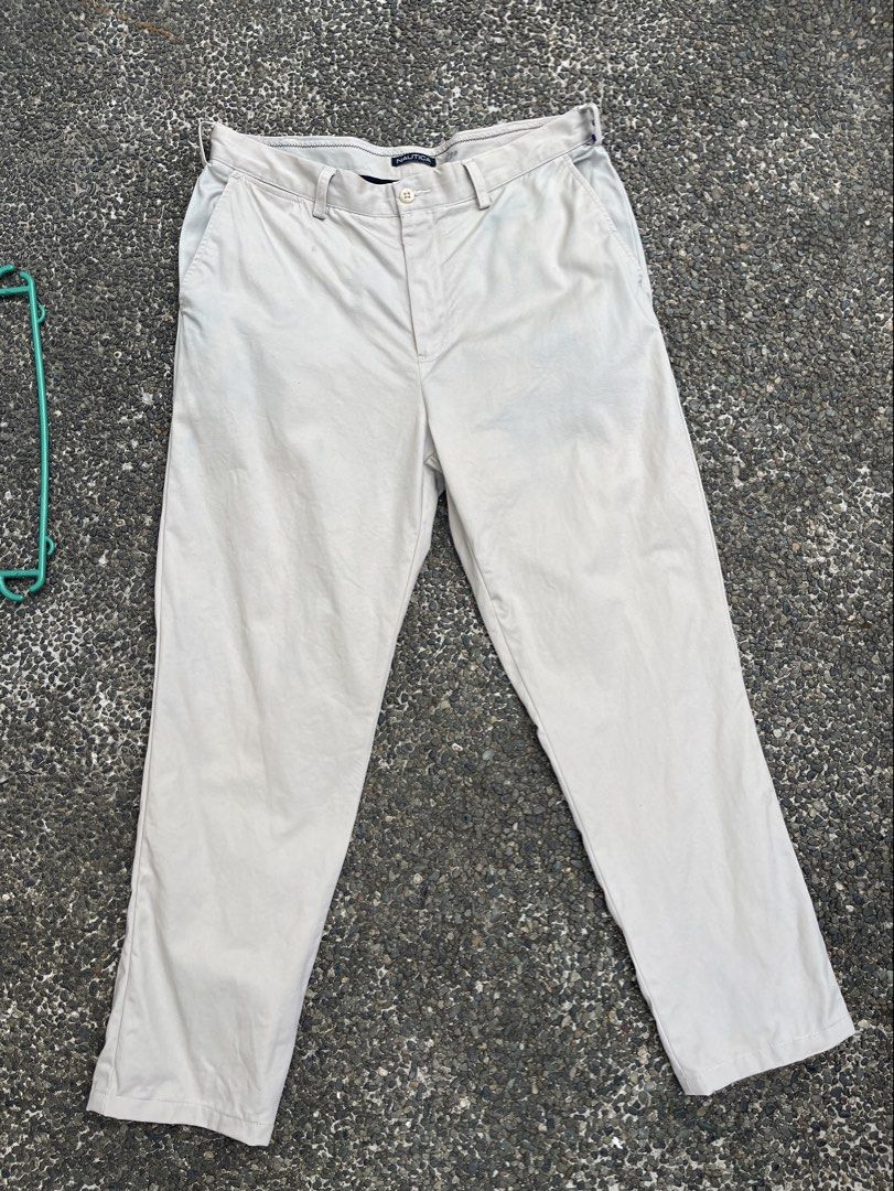 Chino pants white beige light brown with stain (Category: Trousers) located in Cavite. Submitted by Dexter123 (Listing ID 1455857514, Image 1). Description: With minimal stain upper part see pictures.