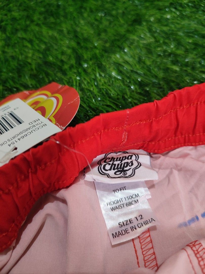 Chupa Chups Boardshorts Red Rainbow (Category: Swim Trunks & Board Shorts) located in Cebu City. Submitted by deadjay84 (Listing ID 1455959268, Image 2). Description: Chupa Chups Boardshorts (Youth) - Size 12 fits small adult 28-30 - Brndnew - 4 way stretch - Color: Red with rainbow stripe on left leg - Features Chupa Chups logo - Elastic waistband with yellow drawstring - Ideal for beach or pool - Pls see photos for details Cebu Loc Add shipping