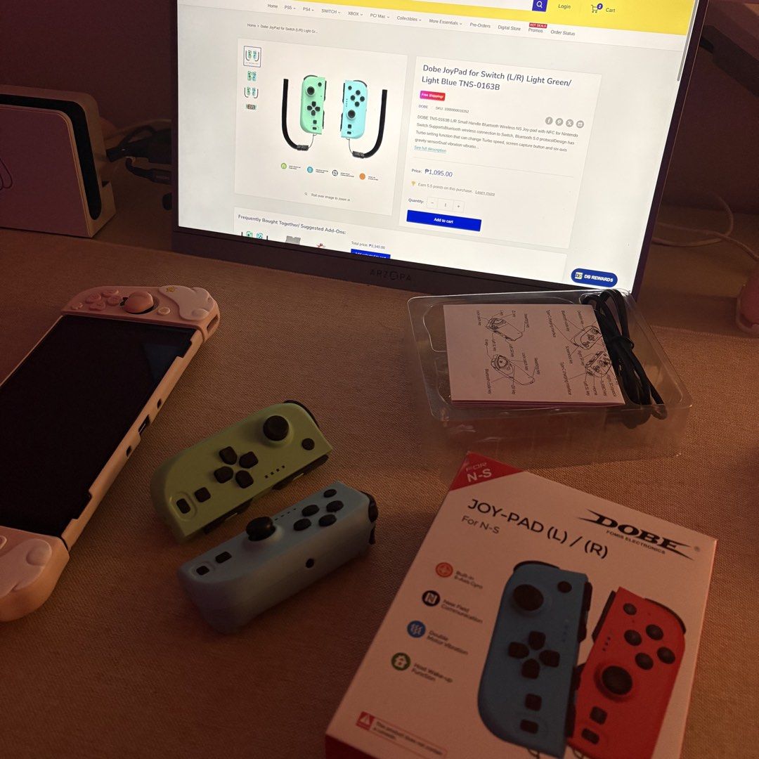 Switch Controller JoyPad Dobe (Category: Controllers) located in Pasig City. Submitted by lyn.declutter (Listing ID 1456051738, Image 2). Description: 🎮 DOBE Joy-Pad — ₱850 * Pastel Green + Blue * Complete pair * With box * just missing straps * Bought for ₱1,100 * Barely used and in very good condition.