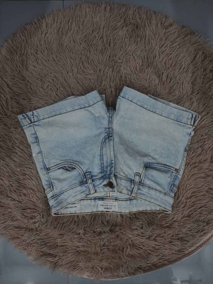 Cotton On Denim Mid Rise Shorts (Category: Shorts) located in Manila. Submitted by shellys_collection (Listing ID 1455870544, Image 1). Description: Quality Rate: 9/10 Color Rate: 9/10 Authentic/Original Issue: minimal stain at the back pocket DIMES: 13.5 W x 12L.