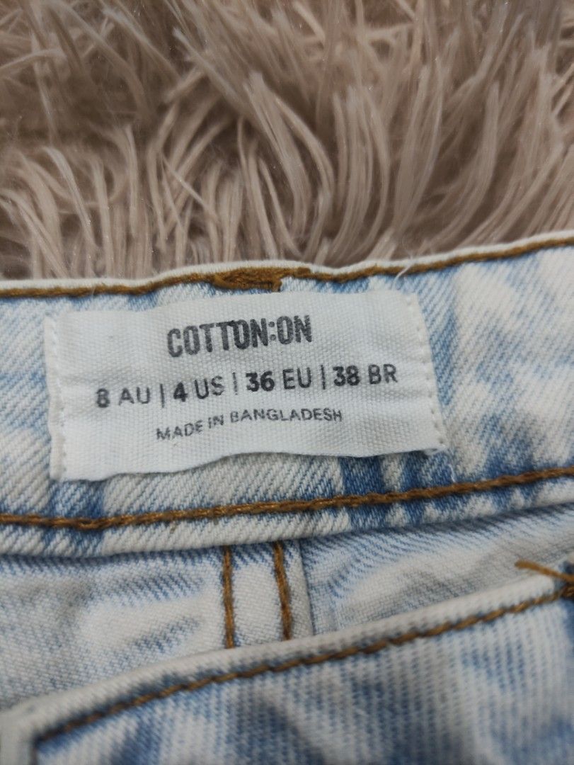 Cotton On Denim Mid Rise Shorts (Category: Shorts) located in Manila. Submitted by shellys_collection (Listing ID 1455870544, Image 2). Description: Quality Rate: 9/10 Color Rate: 9/10 Authentic/Original Issue: minimal stain at the back pocket DIMES: 13.5 W x 12L.