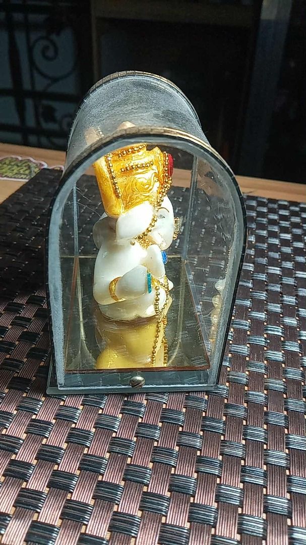 Decorative Ganesha Idol in Display Case (Category: Religious Items) located in Paranaque City. Submitted by zuprocsejon38604 (Listing ID 1456009629, Image 2). Description: - Adorable Ganesha idol in white and gold with vibrant gem accents. - Comes in a clear display case with elegant gold trim. - Ideal for enhancing your home decor or as a thoughtful gift. - Brings a spiritual and serene ambiance to any room..