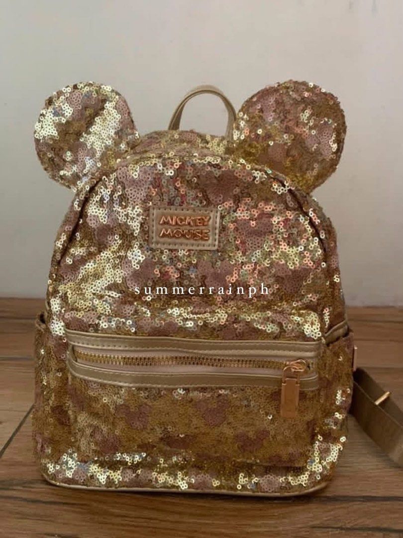 MICKEY BAG AVAILABLE (Category: Diaper Bags & Wetbags) located in Valenzuela. Submitted by summerrainph (Listing ID 1455897349, Image 1). Description: * Sequin with minnie / mickey logo * Mickey / Minnie ears design * Top handle + soft adjustable back straps * Double easy pull up zip opening * Mini but spacious * Front zip pocket * 27*23*10 cm.