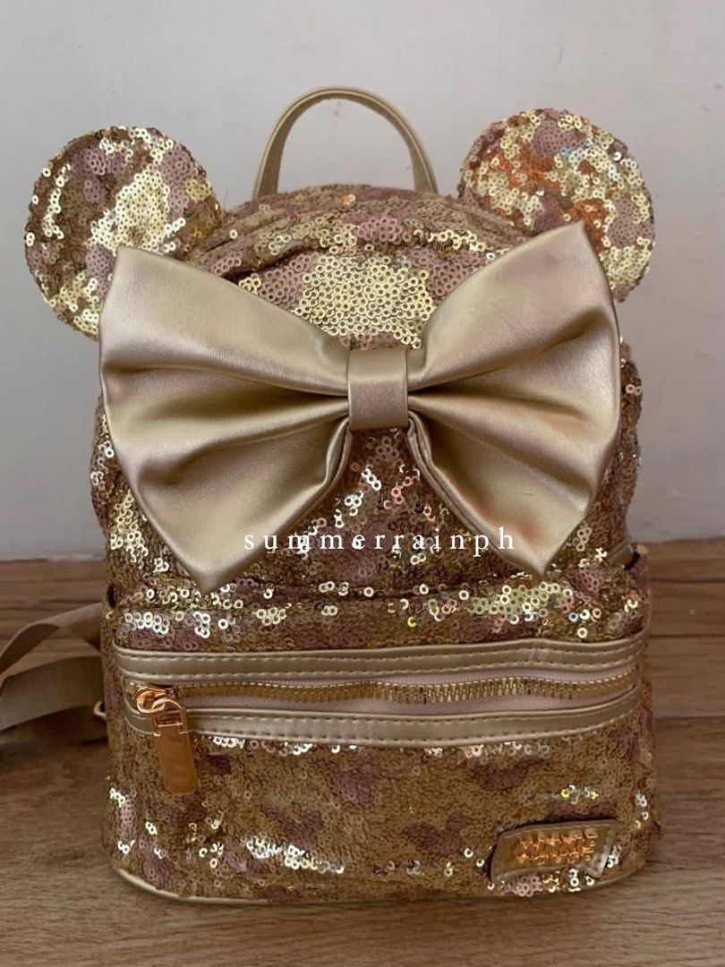 DISNEY MICKEY / MINNIE BAG (Category: Diaper Bags & Wetbags) located in Valenzuela. Submitted by summerrainph (Listing ID 1455897349, Image 3). Description: * Sequin with minnie / mickey logo * Mickey / Minnie ears design * Top handle + soft adjustable back straps * Double easy pull up zip opening * Mini but spacious * Front zip pocket * 27*23*10 cm.