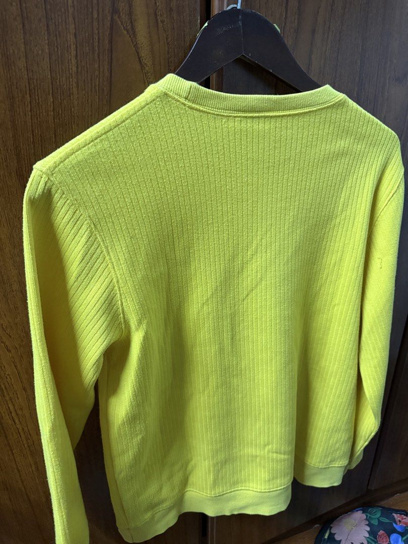 Disney Mickey Mouse Yellow Ribbed Sweatshirt Size 16 (Category: Longsleeves) located in Cavite. Submitted by g1mon (Listing ID 1455995947, Image 2). Description: This item is preloved (not thrifted) Tagged size: 16 Measurements (inches): Pit-to-pit: 19 Length: 23.8 Issues: Small yellow streak on Mickey's face as seen in the pic *Note: Lighting may affect the colour in the image* - Bright yellow Disney sweatshirt - Features a classic Mickey Mouse 