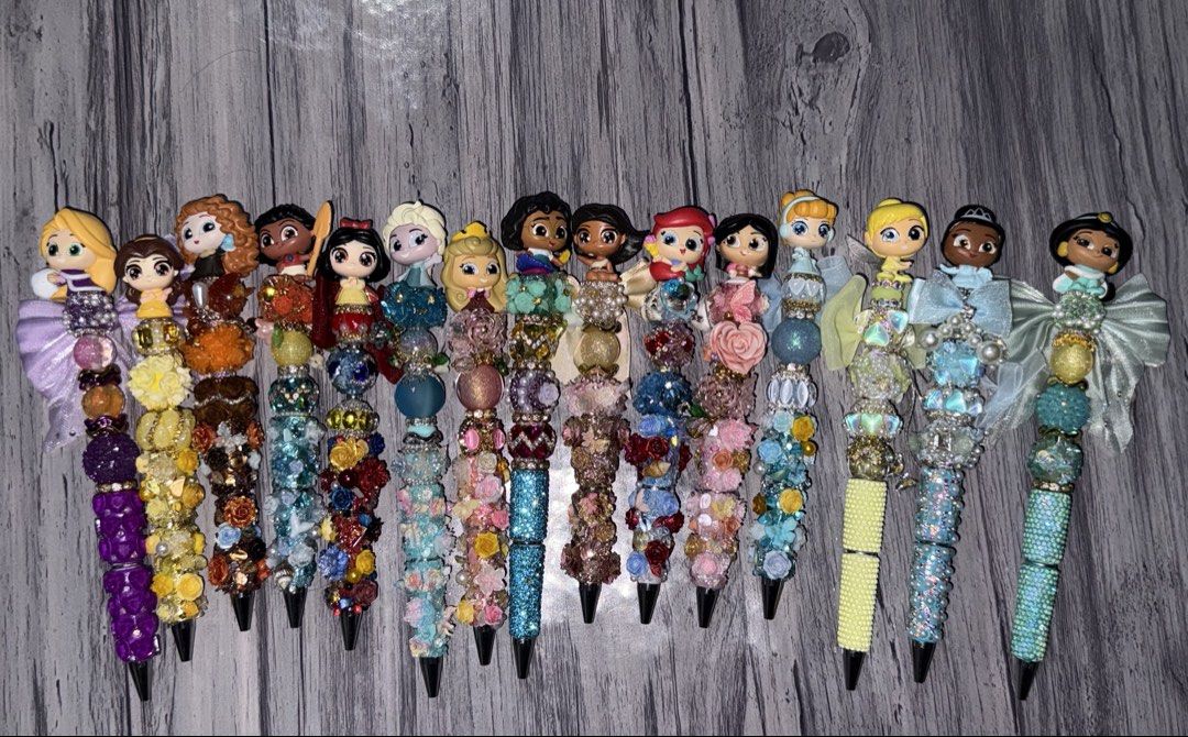 Disney Princess Beaded Pens (Category: Craft Supplies & Tools) located in Hagunoy. Submitted by elaineprz (Listing ID 1455950333, Image 1). Description: - handmade beaded pens. - Each pen features a different Disney princess charm. - Adorned with colorful beads, pearls, and floral accents. - Ideal for journaling, school, or as a special gift. - Writes smoothly for a pleasant writing experience. - Adds a fun and decorative touch to any desk..