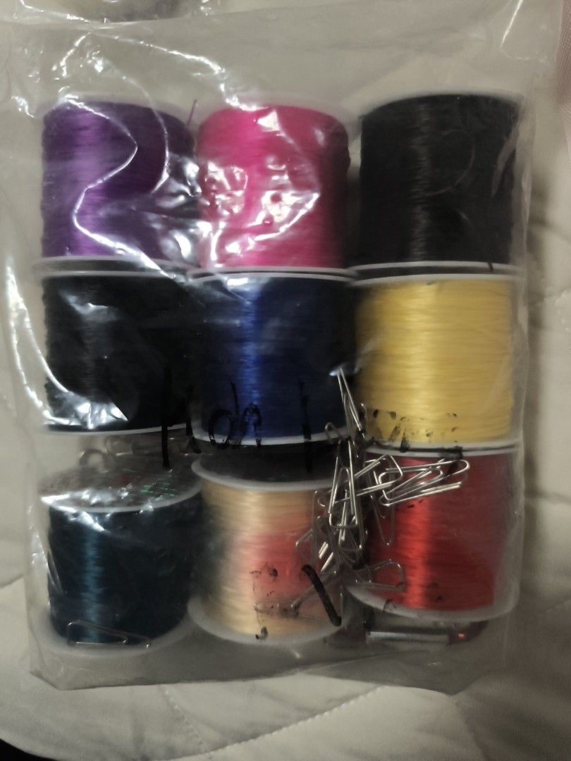 Diy String (Category: Craft Supplies & Tools) located in Singapore. Submitted by deluca88 (Listing ID 1455988869, Image 2). Description: DIY string set with multiple colors (black, pink, purple, yellow, blue, red) and paper clips. Great for crafts. All for $10.