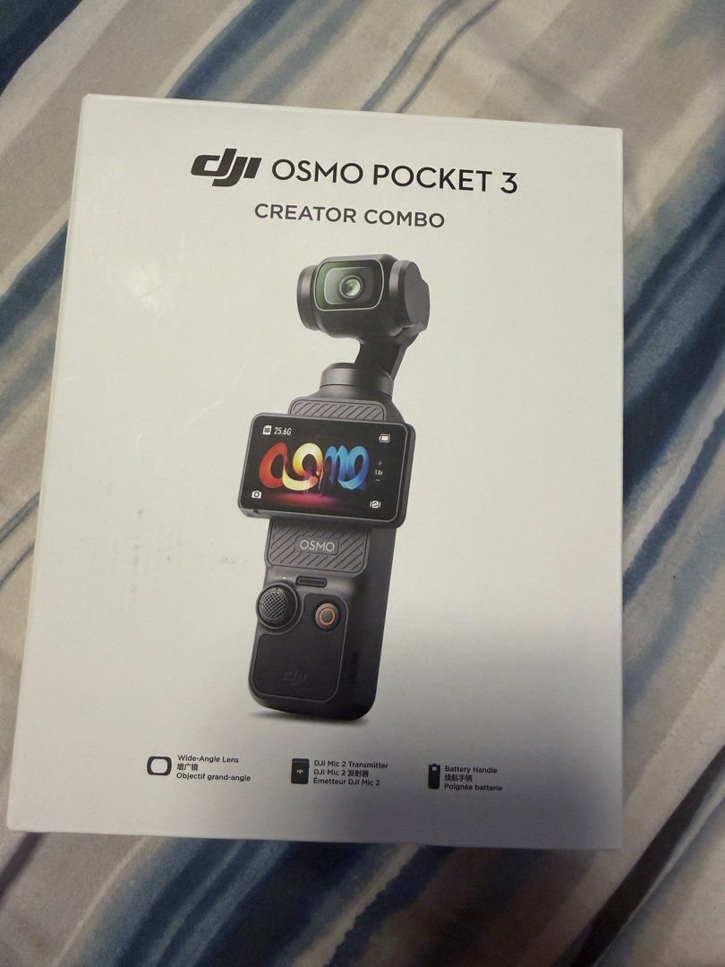 DJI Osmo Pocket 3 Creator Combo Gimbal Camera (Category: Cameras) located in Taytay. Submitted by baniks12 (Listing ID 1455998712, Image 1). Description: - DJI Osmo Pocket 3 Creator Combo - Includes: Wide-Angle Lens, DJI Mic 2 Transmitter, Battery Handle - Also comes with: Protective Cover, Carrying Bag, USB-C Cable - Features: 1-inch CMOS sensor, 2-inch rotatable touchscreen - Performance: Full-pixel fast focusing, 3-axis mechanical stabilizatio
