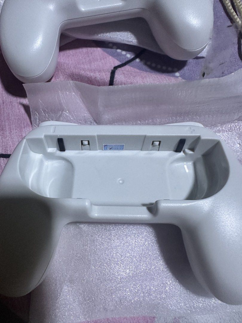 DOBE Controller Grip for N-S Joy-Pad OLED (Category: Controllers) located in Manila. Submitted by edgiedge (Listing ID 1456022372, Image 3). Description: - Enhance your N-S OLED Joy-Pad gaming experience. - Includes a pair (x2) of grips for both left and right Joy-Cons. - Designed specifically for the Nintendo Switch OLED model. - Features a unique appearance patent. - Enjoy a more comfortable and secure grip during gameplay. 📍Tondo.