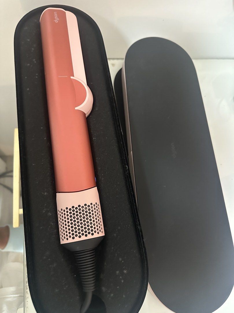 Dyson AirStraight (Category: Hair) located in Manila. Submitted by gwynethlmb (Listing ID 1455985745, Image 3). Description: Dyson Airstrait Straightener - Like New Condition • Condition: Excellent / Good as new (used less than 10 times) • Reason for Selling: Decluttering. Works amazingly well, I just haven’t reached for it in months. • Details: Dries and straightens hair simultaneously using wet-to-dry air technology (no extreme heat/hot plates)