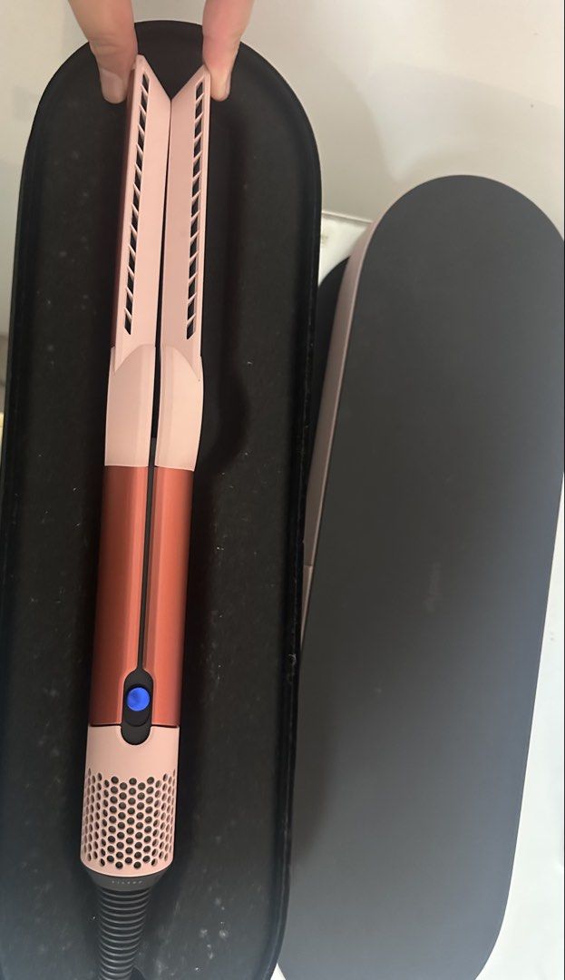 Dyson AirStraight (Category: Hair) located in Manila. Submitted by gwynethlmb (Listing ID 1455985745, Image 2). Description: Dyson Airstrait Straightener - Like New Condition • Condition: Excellent / Good as new (used less than 10 times) • Reason for Selling: Decluttering. Works amazingly well, I just haven’t reached for it in months. • Details: Dries and straightens hair simultaneously using wet-to-dry air technology (no extreme heat/hot plates)