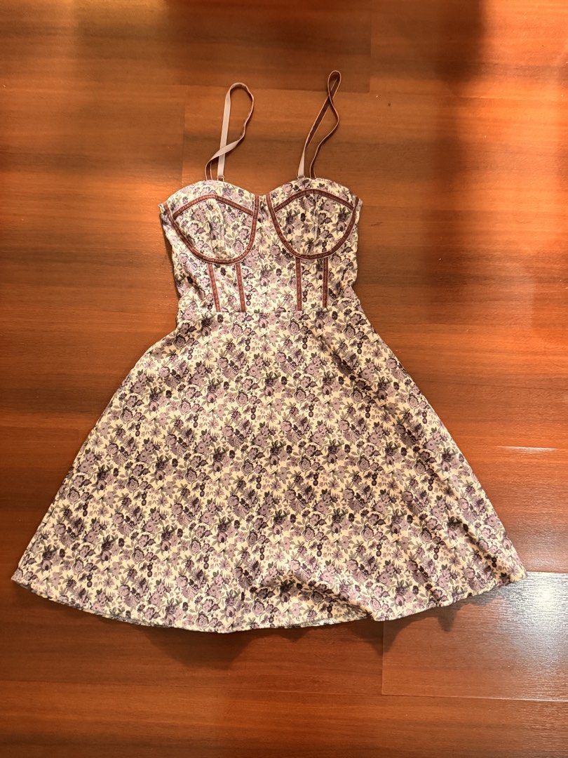 Floral Print Smocked Back Mini Dress (Category: Dresses) located in Las Pinas. Submitted by zzzesells (Listing ID 1455909018, Image 1). Description: - Adorable floral print dress - Flattering sweetheart neckline with corset-style detail - Comfortable smocked back for a perfect fit - Adjustable spaghetti straps - Lightweight fabric, ideal for summer days - Versatile for casual outings or events.