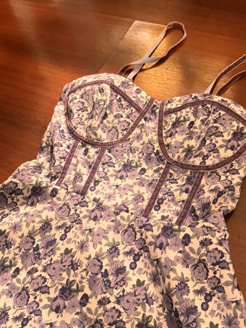 Floral Print Smocked Back Mini Dress (Category: Dresses) located in Las Pinas. Submitted by zzzesells (Listing ID 1455909018, Image 2). Description: - Adorable floral print dress - Flattering sweetheart neckline with corset-style detail - Comfortable smocked back for a perfect fit - Adjustable spaghetti straps - Lightweight fabric, ideal for summer days - Versatile for casual outings or events.