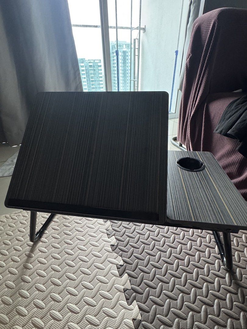 Foldable & adjustable table (Category: Tables & Sets) located in Kuala Lumpur. Submitted by jc40_09 (Listing ID 1455959786, Image 3). Description: Table that’s adjustable (picture shown) Suitable to put on bed for work .