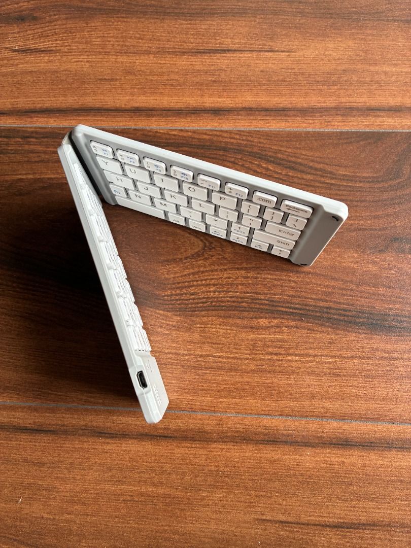 Foldable Wireless Keyboard (Category: Computer Keyboard) located in Quezon City. Submitted by jiggyboy11 (Listing ID 1455906894, Image 2). Description: Foldable keyboard Connection via bluetooth With usb charging cable Location: Near OLPH Parish, Project 8, Quezon City.