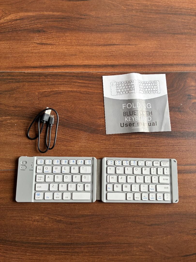 Foldable Wireless Keyboard (Category: Computer Keyboard) located in Quezon City. Submitted by jiggyboy11 (Listing ID 1455906894, Image 1). Description: Foldable keyboard Connection via bluetooth With usb charging cable Location: Near OLPH Parish, Project 8, Quezon City.