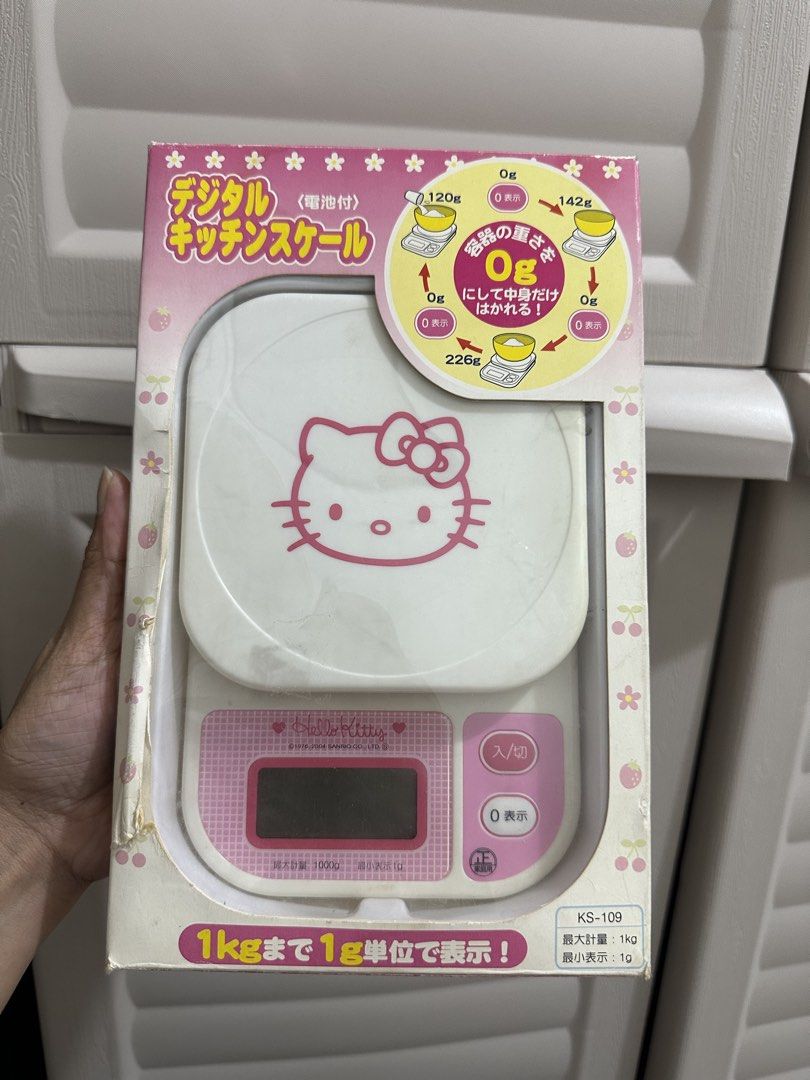 Food weighing scale (original sanrio) (Category: Bakeware) located in Naga. Submitted by bag.net (Listing ID 1455965989, Image 1). Description: Guaranteed original food weighing scale from Japan 🇯🇵 -Hello kitty sanrio character💜 -Brandnew with box/unused -The box has munordirts due to storage but over all like new!💜.