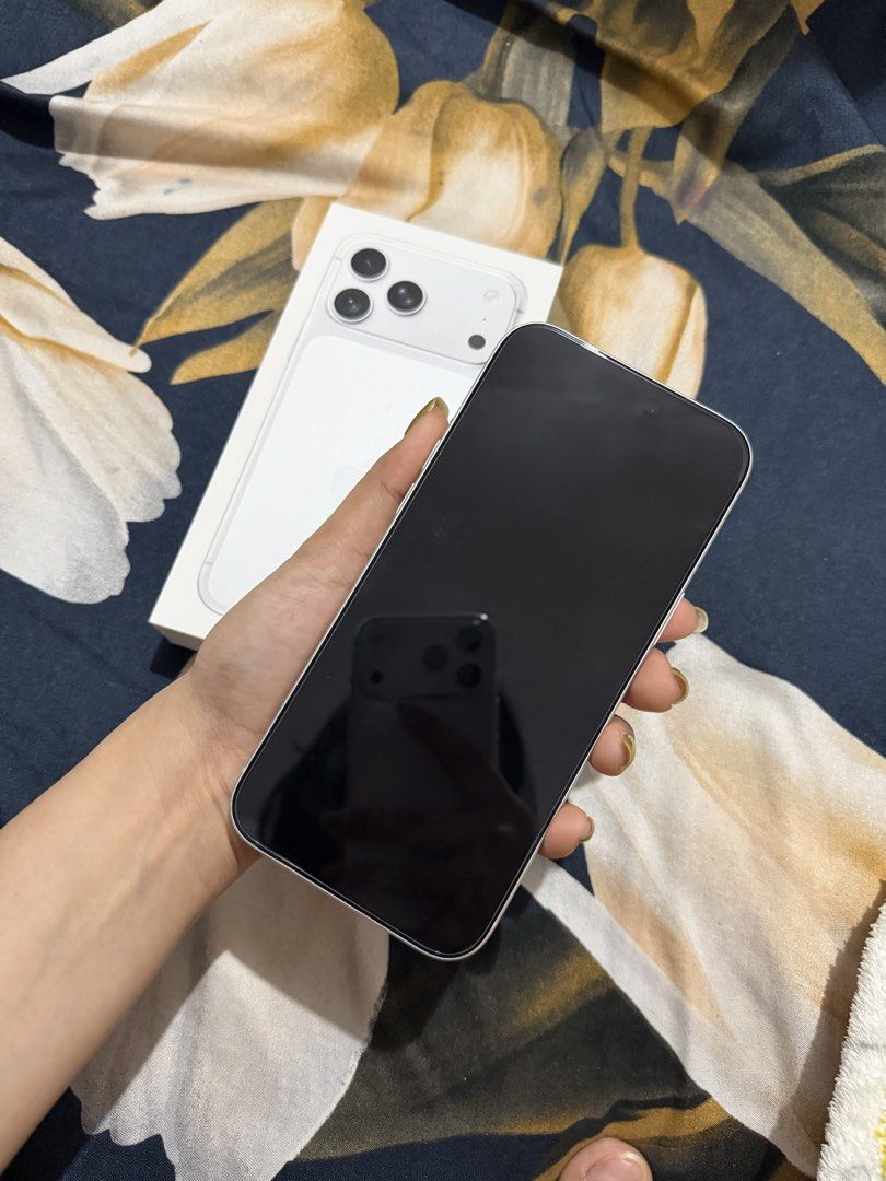 For Sale Iphone 17 Promax (Category: iPhone 17 Series) located in Bulacan. Submitted by vblleee (Listing ID 1455962183, Image 2). Description: 📱 iPhone 17 Pro Max 256GB — For Sale Selling my iPhone 17 Pro Max 256GB, Silver 🤍 ✨ 5 months old ✨ Excellent / like-new condition ✨ No dents, scratches, or issues ✨ Complete with box and accessories ✨ Battery health: 96% ✨ Smartlock Selling price: ₱65,000 — NEGOTIABLE for sure buyers only. RFS: Need fund