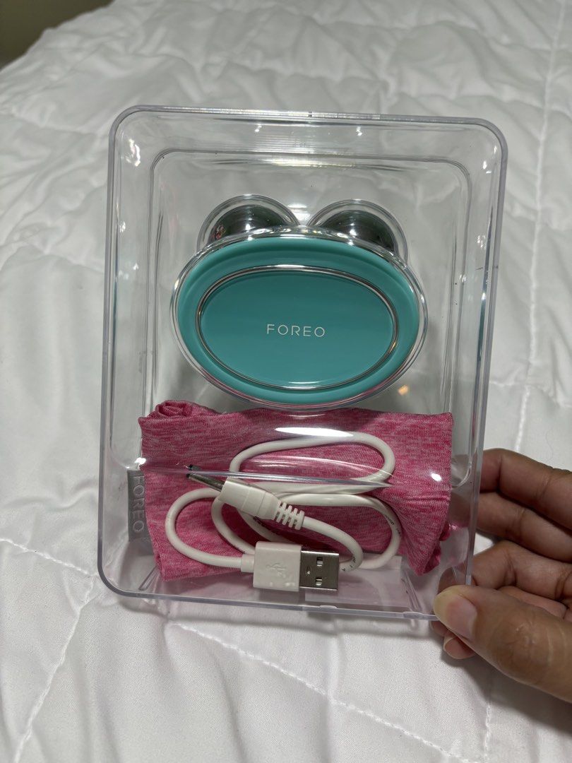 FOREO Bear Mini Facial Toning Device - Mint Green (Category: Face Care) located in Mandaluyong City. Submitted by k_and_k_preloved_corner (Listing ID 1455950855, Image 3). Description: - ￼FOREO BEAR Microcurrent Facial Device - Face Sculpting Tool | Instant Face Lift | Firm & Contour | Chin Lift | Non-Invasive - FOREO Bear Mini in Mint Green - Gently tones and lifts facial contours with microcurrent technology - Comes with original packaging, cha