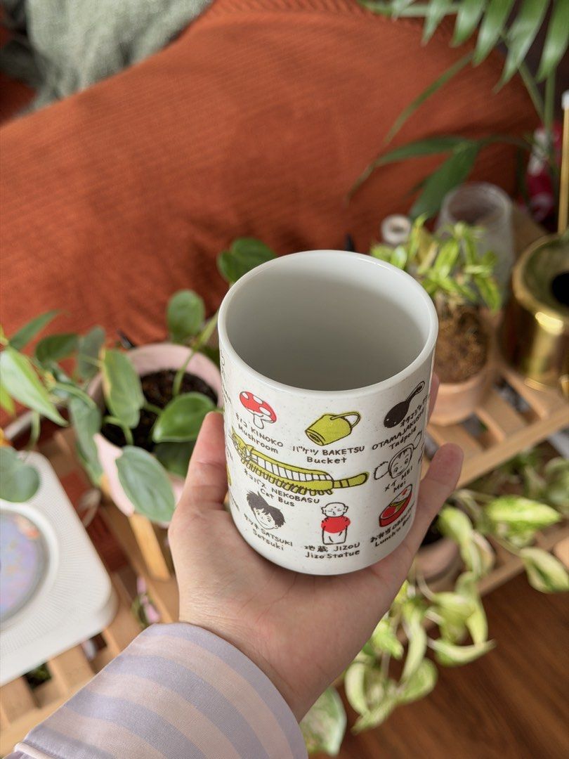 Studio Ghibli "My Neighbor Totoro" ceramic mug (Category: Coffee & Tea Tableware) located in Manila. Submitted by shopcoy (Listing ID 1456009140, Image 3). Description: Item: Studio Ghibli "My Neighbor Totoro" ceramic mug Price: Php 2,500 Stock: 5 cups left Details: • Material: ceramic glass • Microwave and dishwasher safe • Made in Japan (Authentic Japanese craftsmanship) • Perfect for teas, coffee, and matcha lattes!- • Features Totoro, Jiji, C