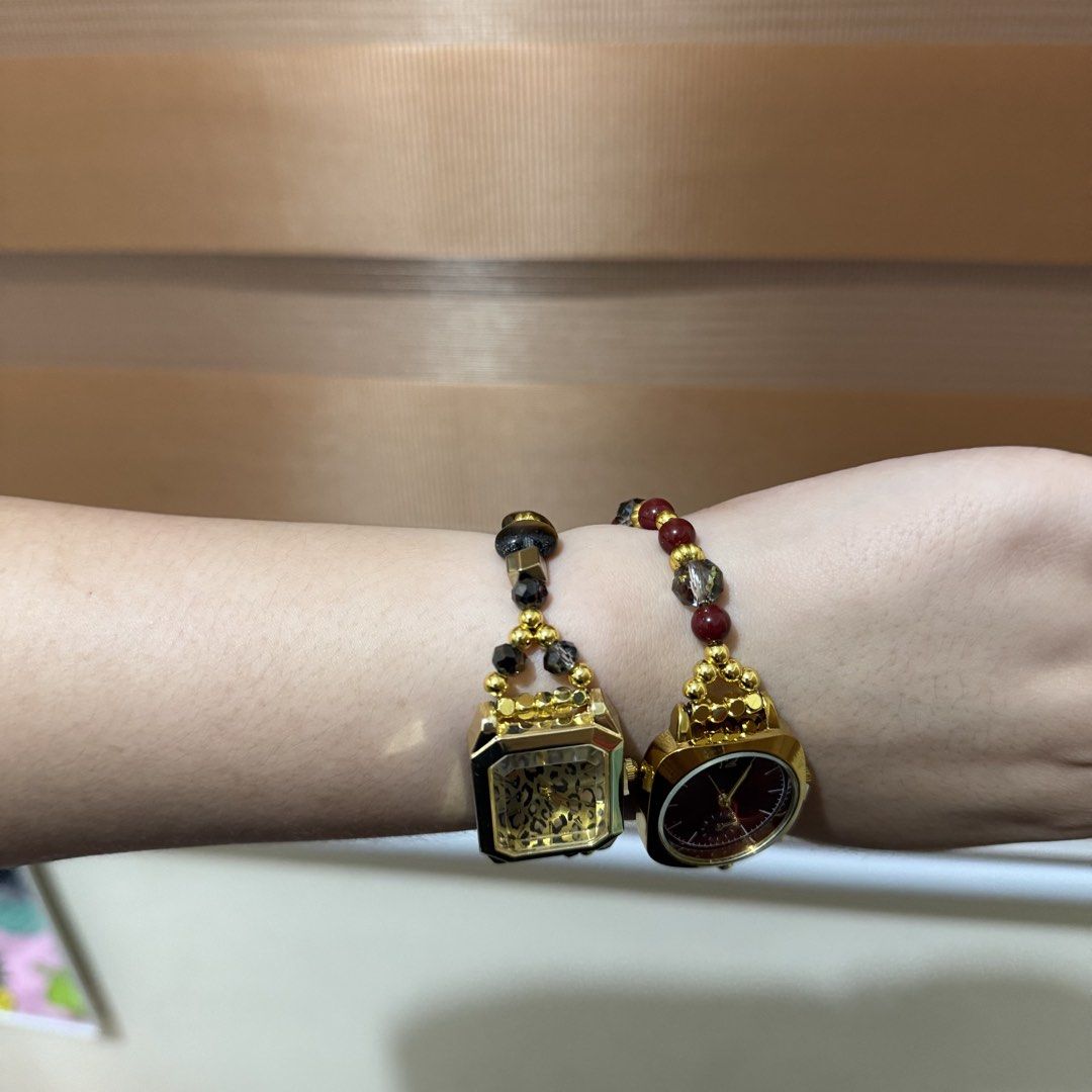 Gold Beaded Bracelet Watch - sold as bundle only (Category: Women's Watches) located in Tarlac. Submitted by feebee01 (Listing ID 1455907519, Image 3). Description: ‼️ you can choose 1 watch for free if you buy 1000+ worth from my listings both are bnew, check last pic, di pa po nagamit yung watches and may lock pa. also includes red pouch. adjustable bracelet strap fashion watch only, unbranded gifted by my sister pero not my style. - leopard di