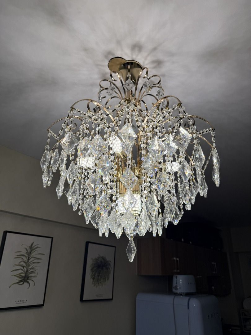 Gold Crystal Chandelier Ceiling Light Fixture (Category: Lighting) located in Manila. Submitted by jonkakkee (Listing ID 1455988570, Image 2). Description: Brand: N/A Model: N/A Size: N/A Dimensions: Shortest Tallness From Ceiling 35 Inch (Adjustable Longer With Chain) & Base Diameter 25 Inch Color: Gold Age Of Item (From Purchase Till Now): <1 Year Whats Included: Item Only Condition: Lightly Used Personal Rating: 9.5 /10 Status: Own Item Purcha