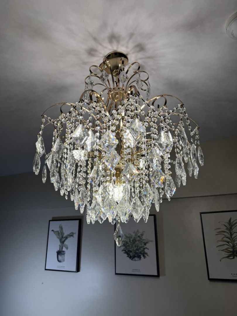 Gold Crystal Chandelier Ceiling Light Fixture (Category: Lighting) located in Manila. Submitted by jonkakkee (Listing ID 1455988570, Image 3). Description: Brand: N/A Model: N/A Size: N/A Dimensions: Shortest Tallness From Ceiling 35 Inch (Adjustable Longer With Chain) & Base Diameter 25 Inch Color: Gold Age Of Item (From Purchase Till Now): <1 Year Whats Included: Item Only Condition: Lightly Used Personal Rating: 9.5 /10 Status: Own Item Purcha