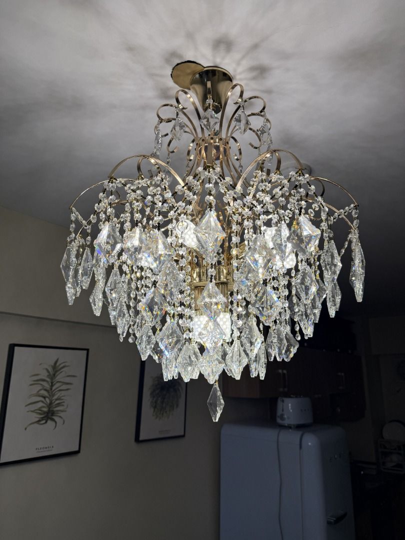 Gold Crystal Chandelier Ceiling Light Fixture (Category: Lighting) located in Manila. Submitted by jonkakkee (Listing ID 1455988570, Image 1). Description: Brand: N/A Model: N/A Size: N/A Dimensions: Shortest Tallness From Ceiling 35 Inch (Adjustable Longer With Chain) & Base Diameter 25 Inch Color: Gold Age Of Item (From Purchase Till Now): <1 Year Whats Included: Item Only Condition: Lightly Used Personal Rating: 9.5 /10 Status: Own Item Purcha