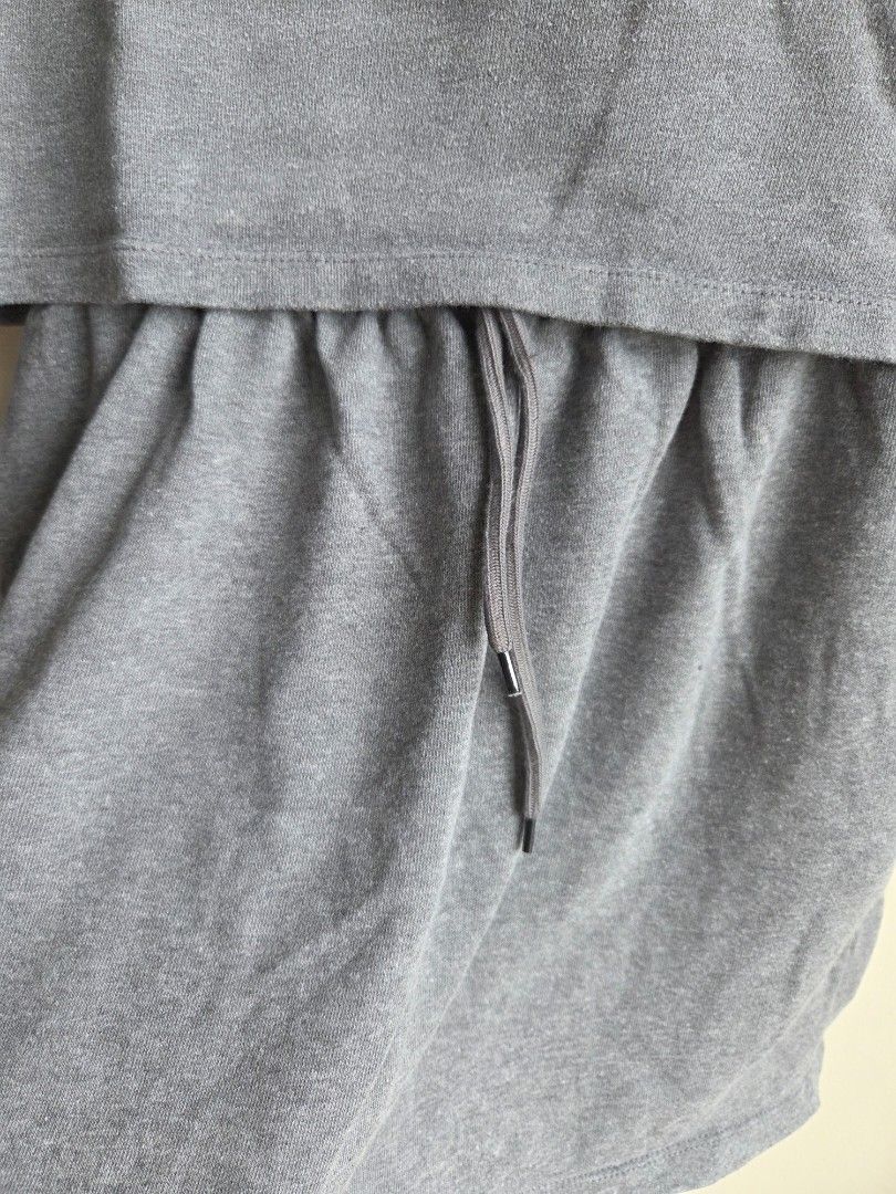 Grey Sweatshirt and Skirt Set (Category: Sets or Coordinates) located in Quezon City. Submitted by strwbry.ph (Listing ID 1455907545, Image 2). Description: - Cozy grey sweatshirt and skirt set - Soft, comfortable fabric - Skirt features a drawstring waist for adjustable fit - Ideal for loungewear or casual outings - Easy to wear and effortlessly stylish.