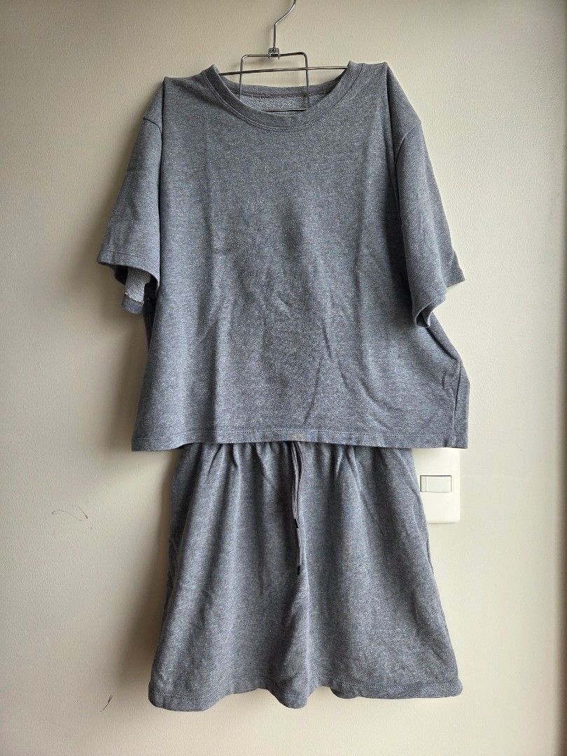 Grey Sweatshirt and Skirt Set (Category: Sets or Coordinates) located in Quezon City. Submitted by strwbry.ph (Listing ID 1455907545, Image 1). Description: - Cozy grey sweatshirt and skirt set - Soft, comfortable fabric - Skirt features a drawstring waist for adjustable fit - Ideal for loungewear or casual outings - Easy to wear and effortlessly stylish.