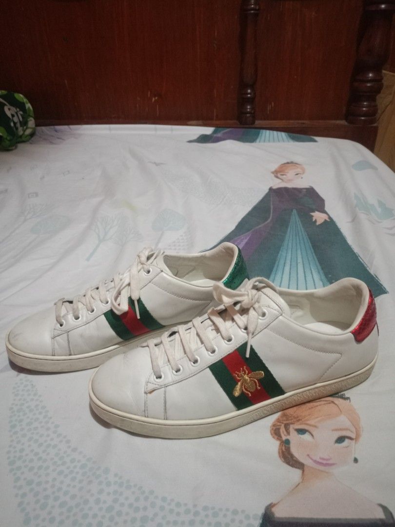Gucci Ace Bee Sneakers White Green Red (Category: Sneakers) located in Davao. Submitted by cleo1812 (Listing ID 1456000335, Image 1). Description: - White Leather Gucci Ace Sneakers - Iconic Green and Red Stripe - Gold Bee Embroidery Detail - Snake-Embossed Green & Red Leather Heel - Classic Gucci Design ‼️Need wash or thorough cleaning ‼️ SIZE 38 1/2.