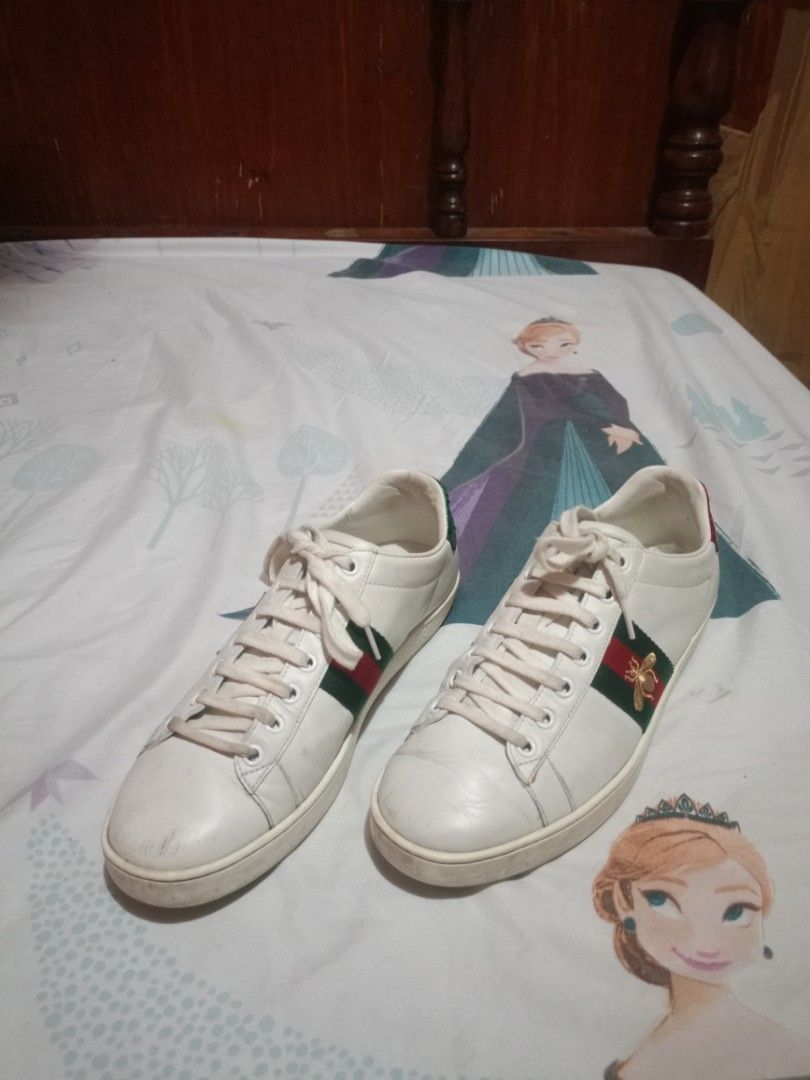 Gucci Ace Bee Sneakers White Green Red (Category: Sneakers) located in Davao. Submitted by cleo1812 (Listing ID 1456000335, Image 2). Description: - White Leather Gucci Ace Sneakers - Iconic Green and Red Stripe - Gold Bee Embroidery Detail - Snake-Embossed Green & Red Leather Heel - Classic Gucci Design ‼️Need wash or thorough cleaning ‼️ SIZE 38 1/2.
