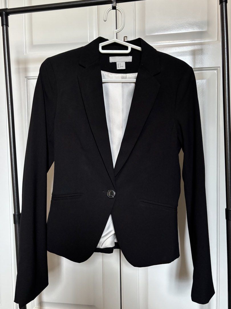 H&M Black Single Button Blazer (Category: Coats, Jackets and Outerwear) located in Quezon City. Submitted by thyca (Listing ID 1455867447, Image 1). Description: - Classic black blazer from H&M - Single button closure - Sharp, professional lapel design - Smooth, light-colored lining - Versatile for work or smart casual outfits - Easily pairs with trousers or skirts - Used twice only.