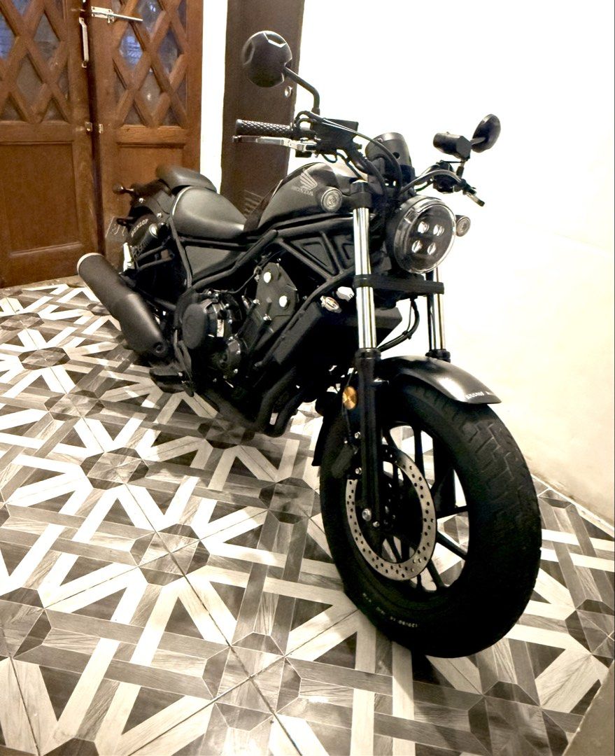 Honda Rebel 500 Motorcycle (Category: Motorbikes for Sale) located in Quezon City. Submitted by 27niceguy (Listing ID 1455959631, Image 1). Description: FOR SALE OR SWAP HONDA REBEL 500 JET BLACK EDITION -2021 MODEL - COMPLETE ORIG PAPERS -Updated Registration - 2 ORIG KEYS -Manual Booklet - 8K ODO - GAS AND GO -WITH RFID NORTH AND SOUTH NO ISSUE! FOR ONLY 295k NEGO FOR CASH BASIS SWAPPING VALUE 300k RFS: Upgrade to Rebel 1100 TANDANG SORA, QC AR