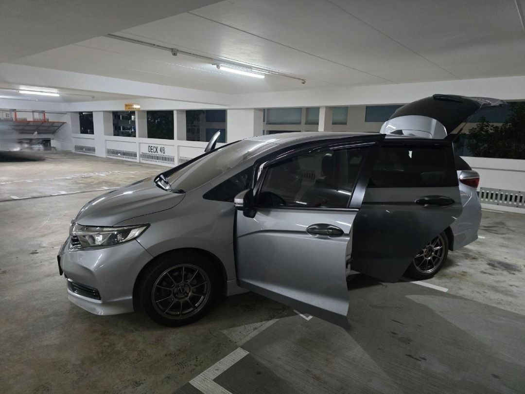 Honda Shuttle 1.5 G Keyless/Navi Honda Sensing (A) (Category: Used Cars) located in Singapore. Submitted by stylo.gadgets (Listing ID 1455946674, Image 2). Description: Core Specs • Engine: 1.5L 4-cylinder inline 16-valve DOHC i-VTEC • Power Output: 127 hp and 155 Nm of torque • Transmission: 7-Speed Automatic CVT (Continuously Variable Transmission) • Fuel Economy: ~22 km/L (full tank yields up to 760 km) • Boot Capacity: 570L (expands significa
