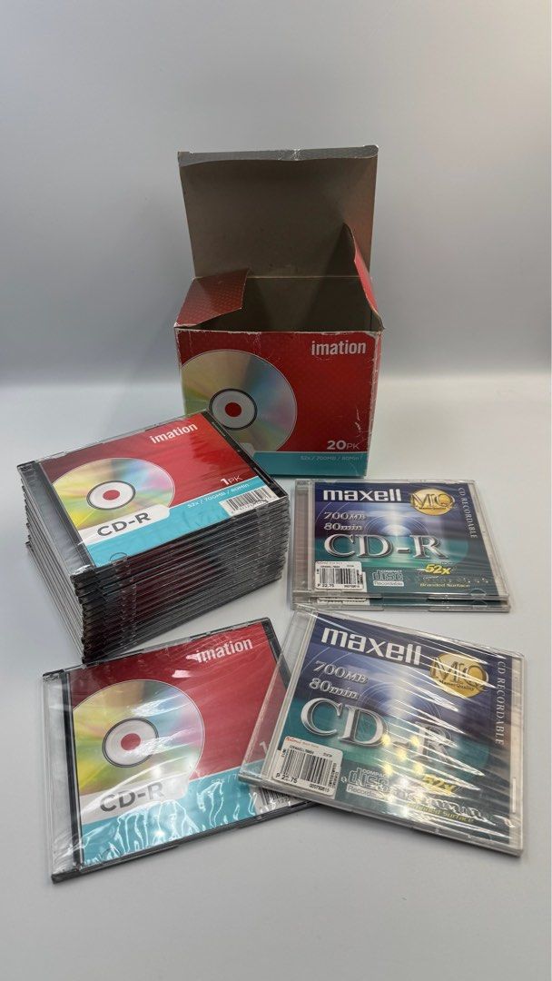 Imation & Maxell CD-R 700MB 80min 52x Blank Recordable Discs (Category: CDs & DVDs) located in Manila. Submitted by mysticstar_d67ad3_tree (Listing ID 1456000803, Image 1). Description: - Bundle includes: 15 Imation CD-Rs (700MB/80min, 52x) and 3 packs of Maxell CD-Rs (700MB/80min). - Ideal for burning music, data, or creating backups..