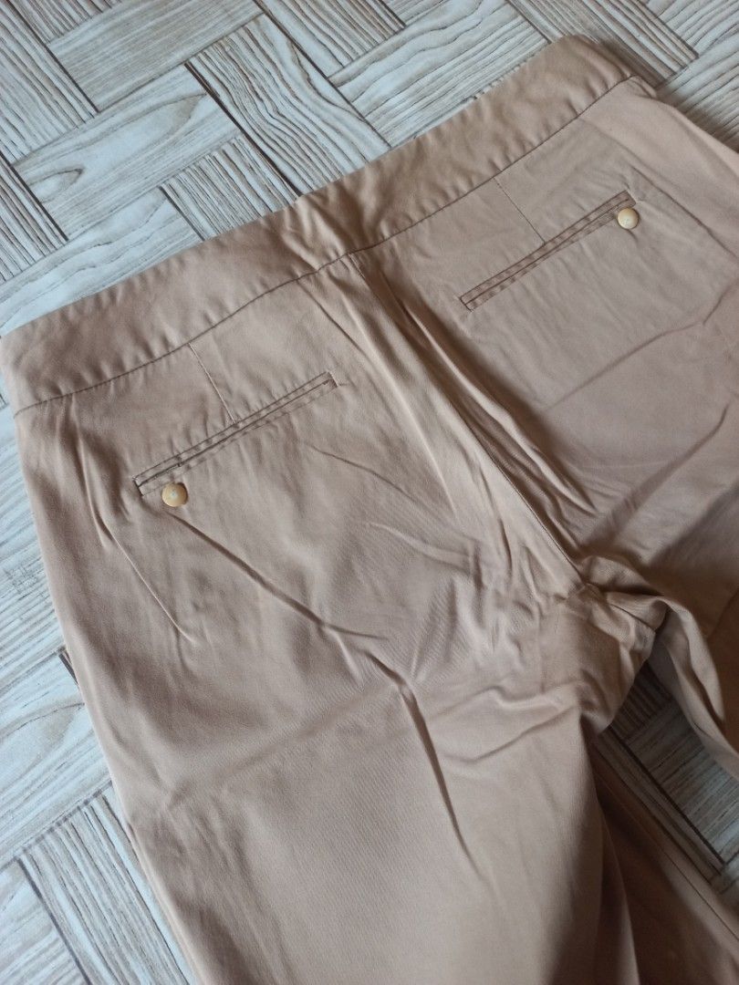 J. Crew Beige Chino Shorts Size L (Category: Shorts) located in Rizal. Submitted by magi_declutters (Listing ID 1456020520, Image 3). Description: - Brand: J. Crew - Color: Beige - Style: Chino Shorts - Size: L - Condition: Good for casual wear - Features: Classic style, 2 front pockets, 2 back pockets with button closure, button and zip front closure - Measurements: - Length: 48cm - Width: 45cm - Waist: 80cm - Leg hole: 23cm.
