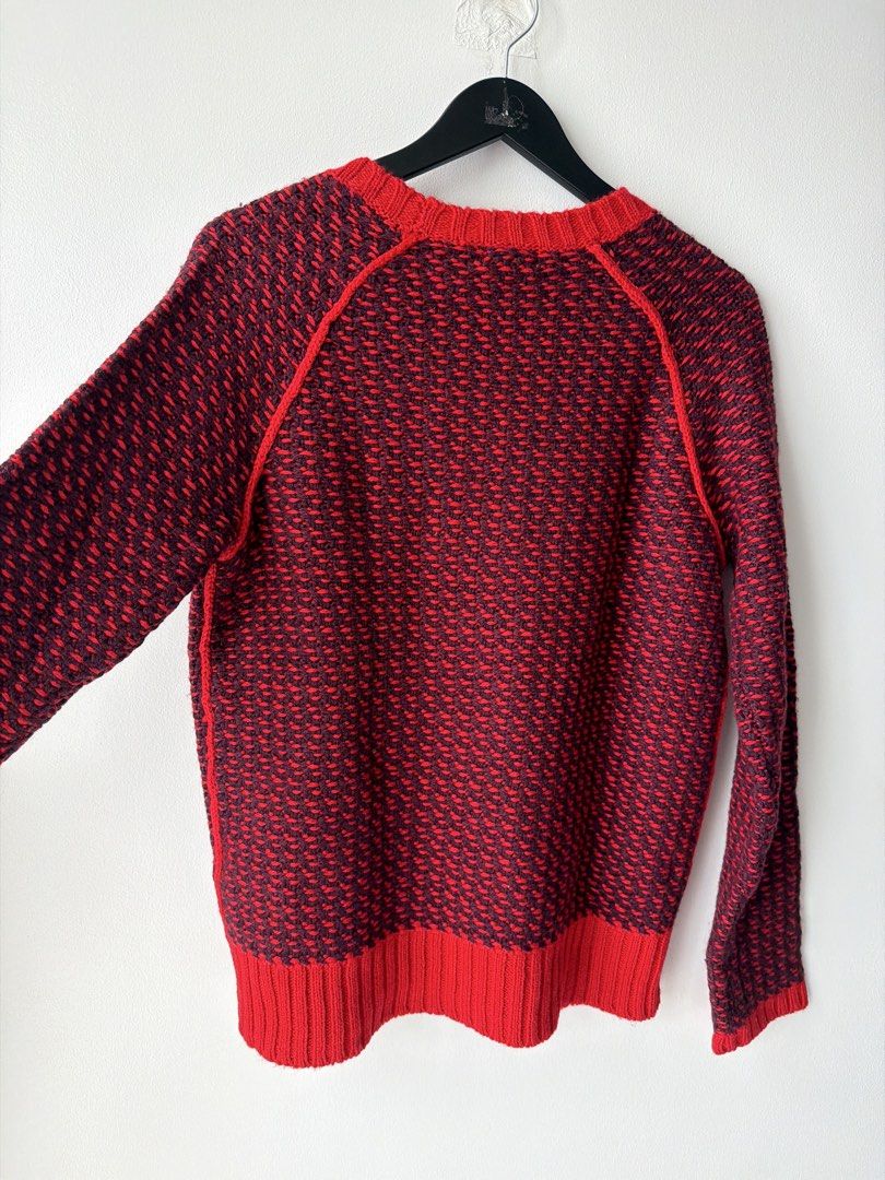 Joe Fresh Red & Black Knit Sweater M/M (Category: Longsleeves) located in Makati City. Submitted by cheapipie (Listing ID 1455920935, Image 2). Description: - Joe Fresh knit sweater - Red and black patterned knit - Crew neck with raglan sleeves - Ribbed cuffs and hem - Material: Acrylic, wool blend - Versatile for layering or standalone wear - Measurements: Chest approx. 19 inches.